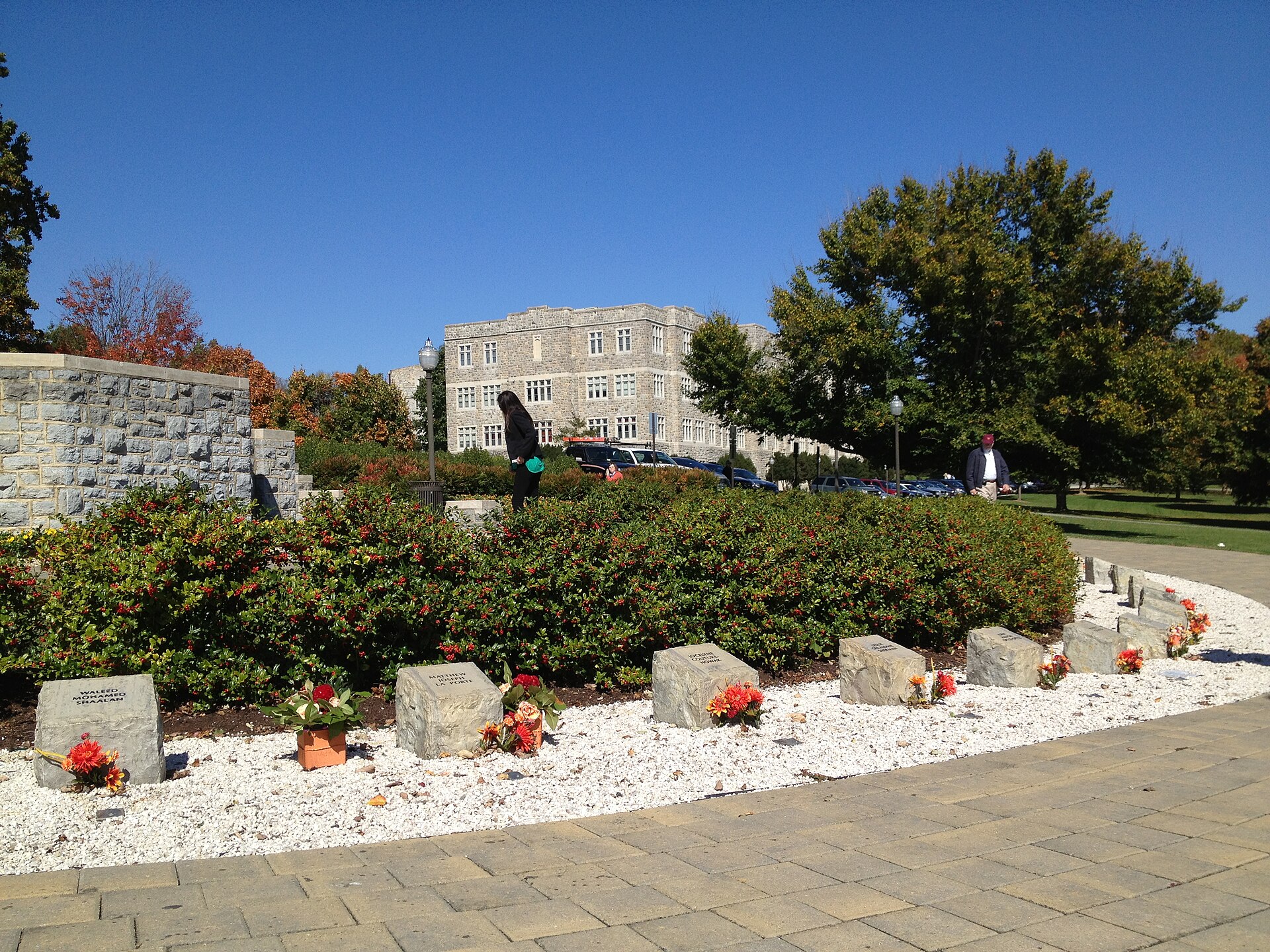 Hokie Stone markers and flowers at the April 16 Memorial in front of Burruss Hall at Virginia Tech