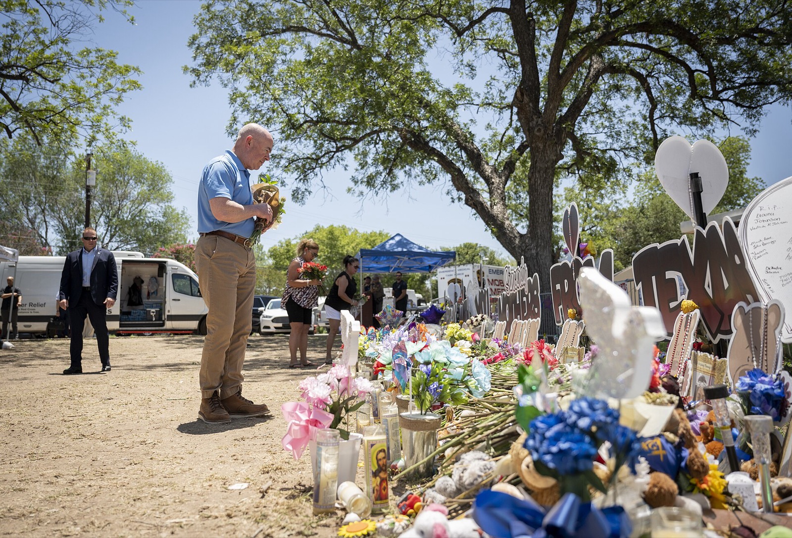 Memorial flowers and tributes outside Robb Elementary School in Uvalde