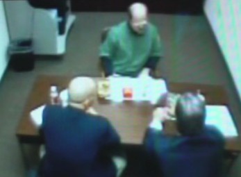 FBI agent Bob Morton and KBI investigator Ken Landwehr interviewing Dennis Rader after his arrest in 2005